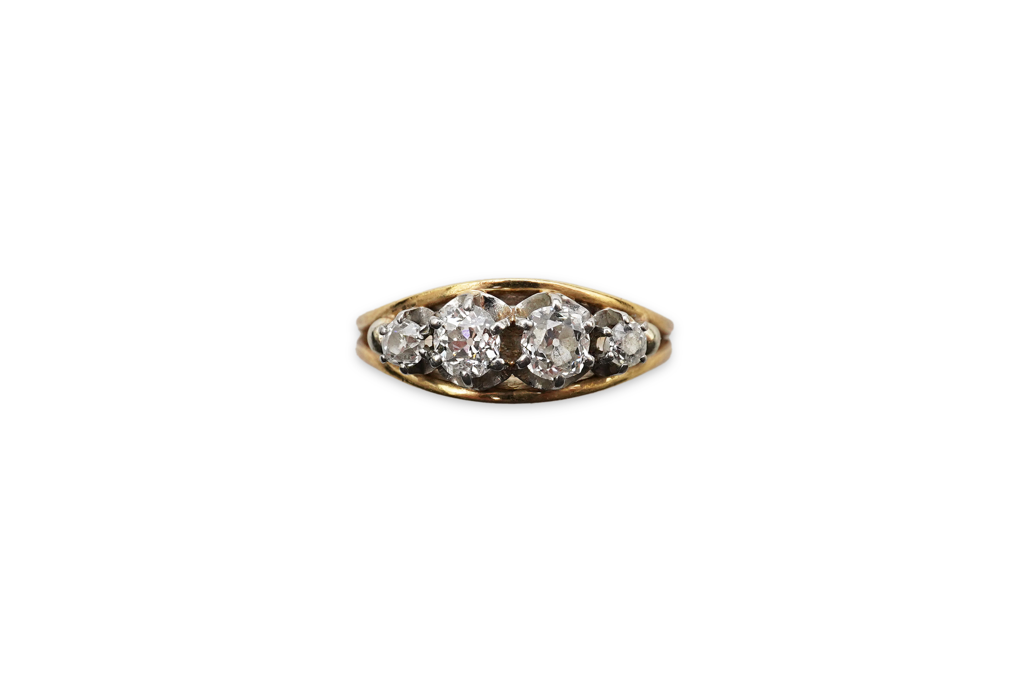 A four-stone diamond ring, mid 20th century